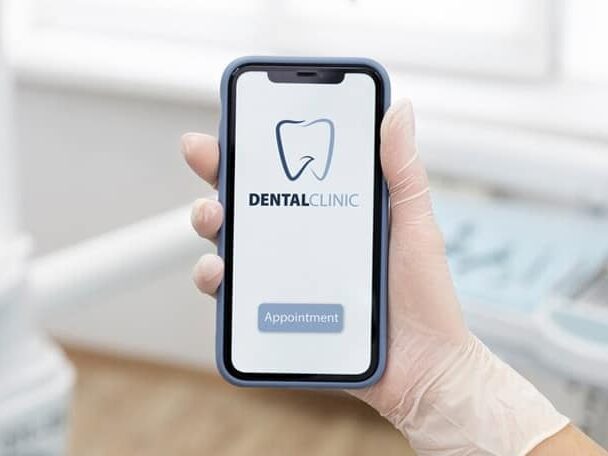 Generic dental website layout with stock images and common tagline.